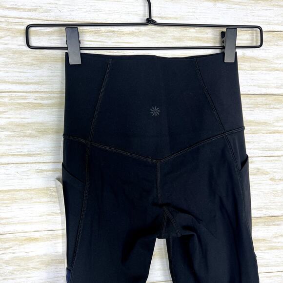 Athleta NWT Salutation Stash Pocket Twist II 7/8 Tight Black/Navy - Picture 8 of 8